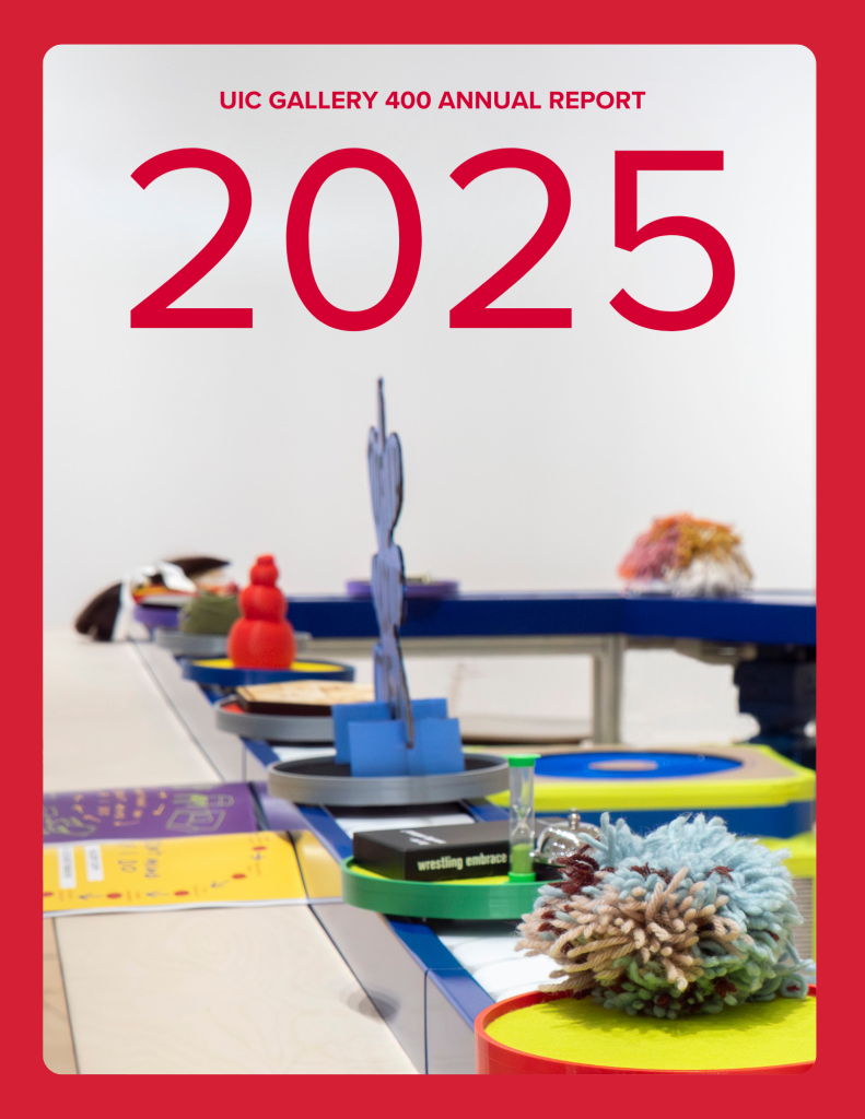 Cover of the UIC Gallery 400 Annual Report 2025, featuring large red “2025” text at the top. Below, a curved blue table displays colorful sculptural objects and art materials—stacked shapes, a cutout figure standing upright, textured yarn-like forms, and books—set against a light background with a bold red border.